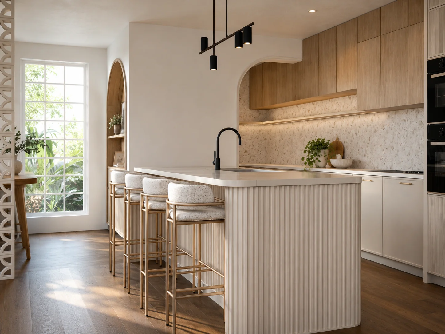 Kitchen and alfresco connection with geometric breeze-block screen, fluted island and brass stools